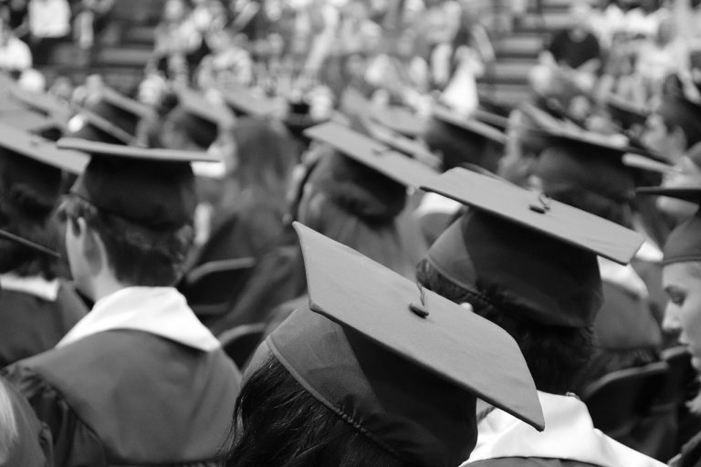 Group of graduates wearing caps and gowns